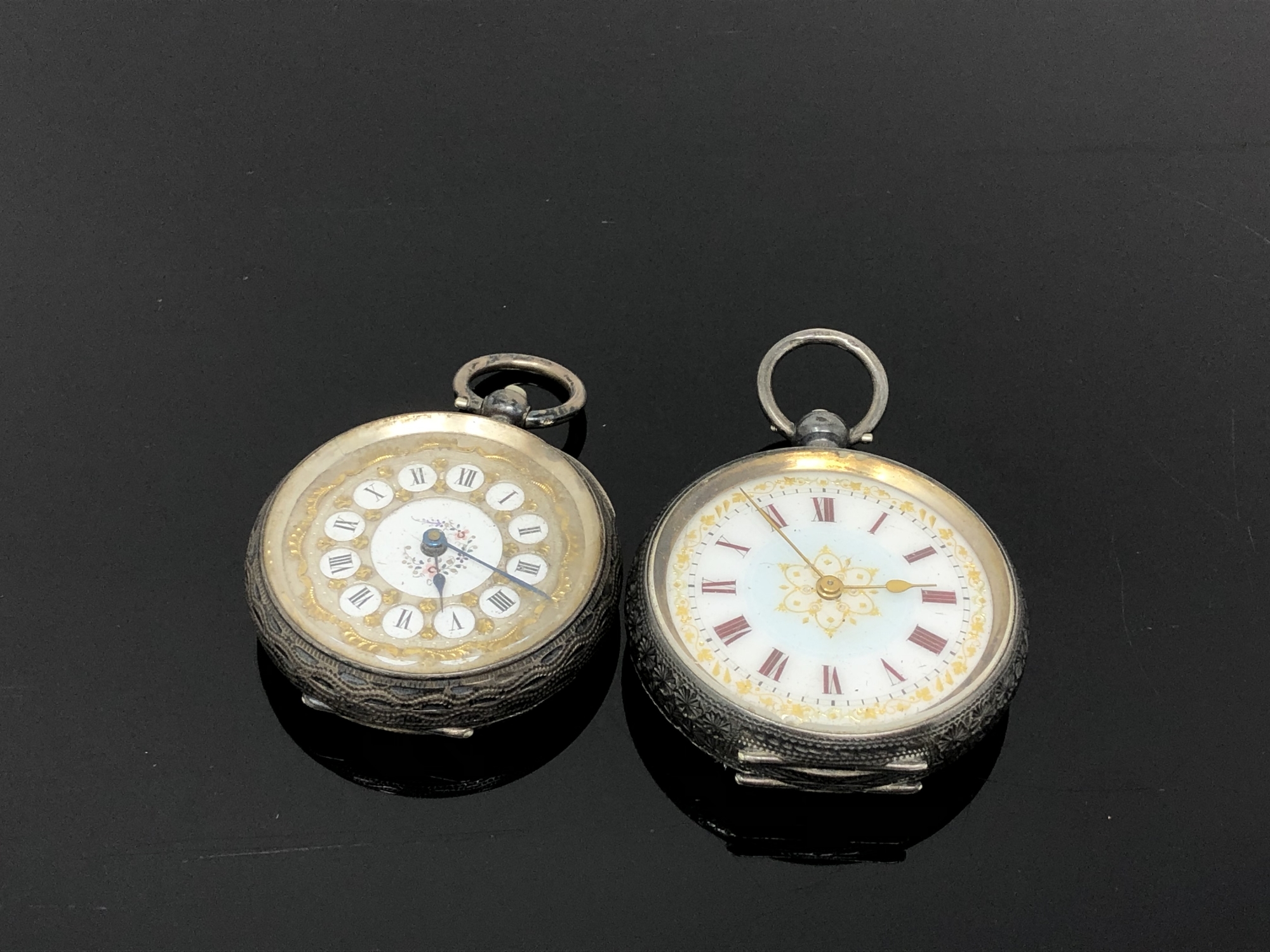 Two antique silver fob watches