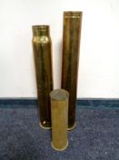 Three brass ammunition shell casings