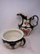 A 19th century floral patterned wash jug and chamber pot