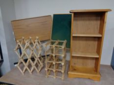 A set of pine open shelves together with a bed table,