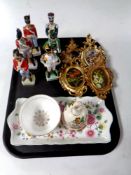 A tray containing six ceramic military figures, four miniature ornate gilt framed oils (still life),