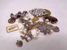 A quantity of costume jewellery, commemorative coin,