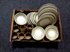A box containing a quantity of J & G Meakin tea and dinnerware
