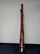 A large bundle of assorted fishing rods to include split cane fly rods