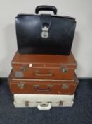 Three 20th century vintage luggage cases together with a leather business bag