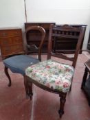 A Victorian mahogany balloon back chair together with a further Edwardian dining chair