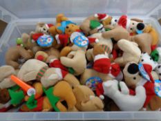 A plastic storage crate containing a large quantity of Christmas soft toys