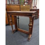 A 19th century mahogany mirrored cabinet back