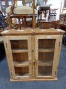 A pine double door wall cabinet (as found)