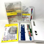 A Swatch World Kit 2 wristwatch in box with contents.
