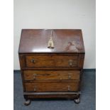 A 20th century oak bureau