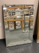 An all glass contemporary mirror,