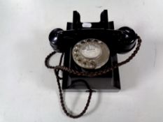 A vintage black Bakelite telephone