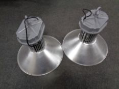 A pair of industrial style light fittings,