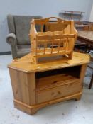 A pine corner TV stand fitted a drawer together with a pine magazine rack