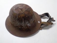 A World War II tin helmet