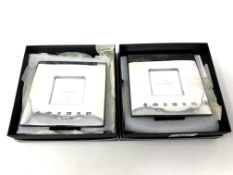 A pair of silver Concorde photo frames by Carrs of Sheffield, 2003, each 12cm by 12cm, boxed.