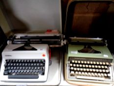 Two cased 20th century typewriters by Olympia and Remington