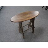 An elm and beech oval stool