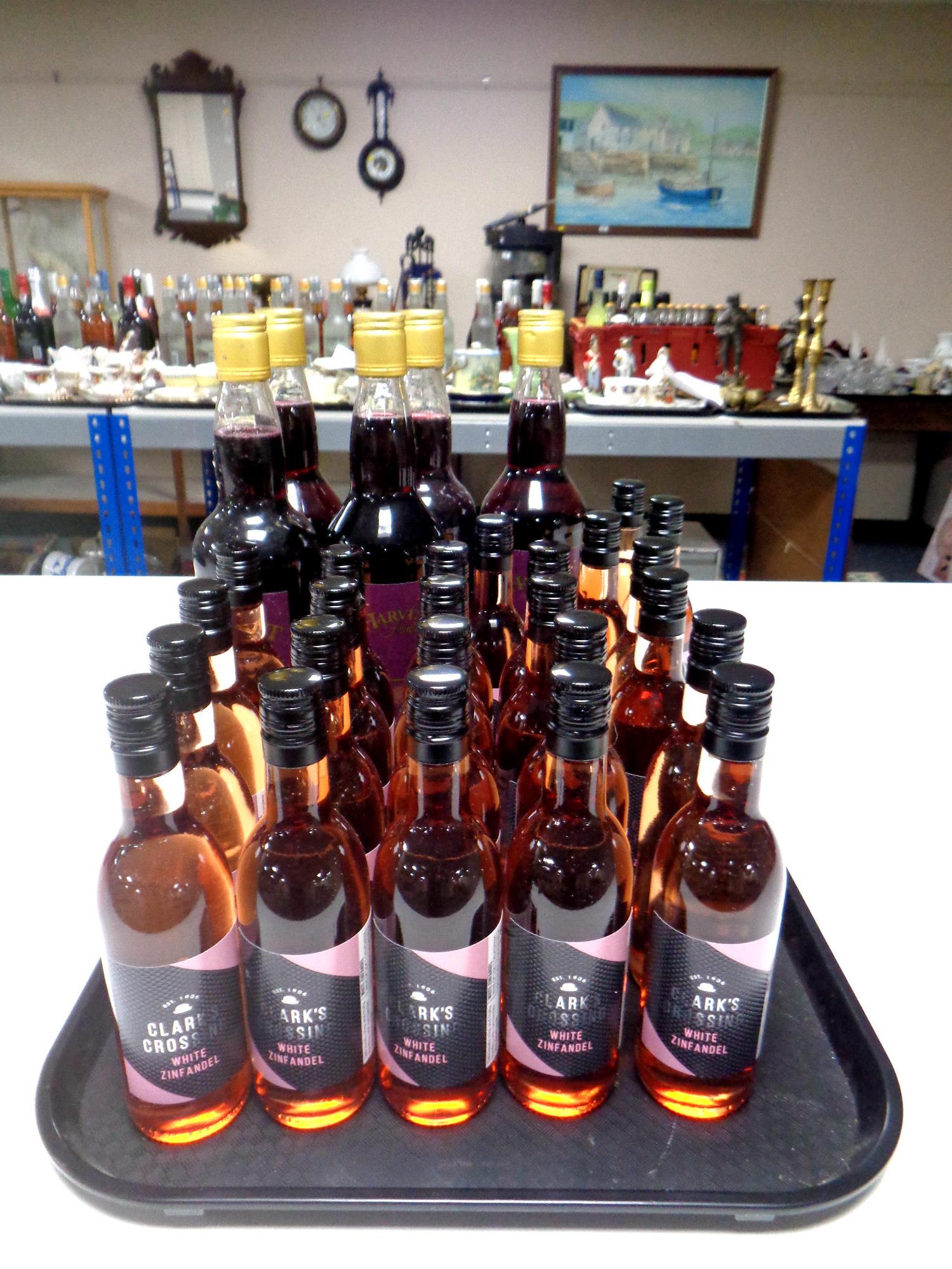 A tray containing five bottles of Harvest Fruits Mulled Wine together with 24 bottles of Clark's