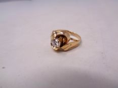 A 14ct gold dress ring set with cubic zirconia