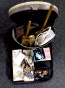 A tray containing assorted costume jewellery, lady's wristwatches, dressing table brush set,