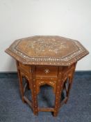 A folding Indian octagonal inlaid occasional table