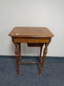 A 19th century walnut work table