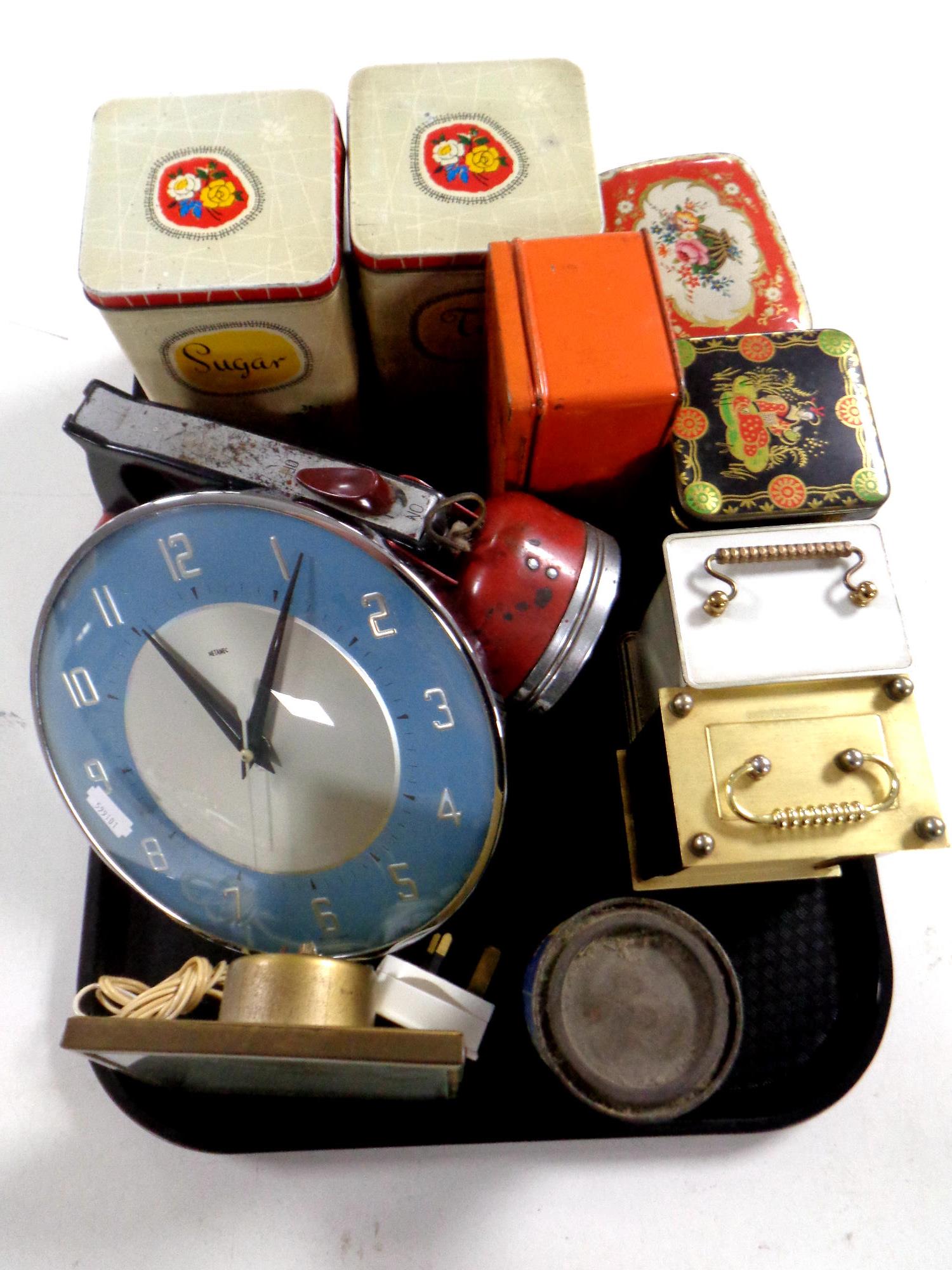 A tray containing mid 20th century and later clocks to include Metamec carriage clocks together