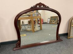 A Victorian style mahogany overmantel mirror, width 127 cm.