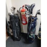 Two golf bags containing irons and drivers to include Paragon,