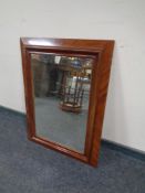 A late 19th century mahogany framed wall mirror