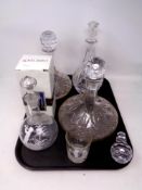 A tray containing antique and later decanters to include boxed RCR decanter, ship's decanter,