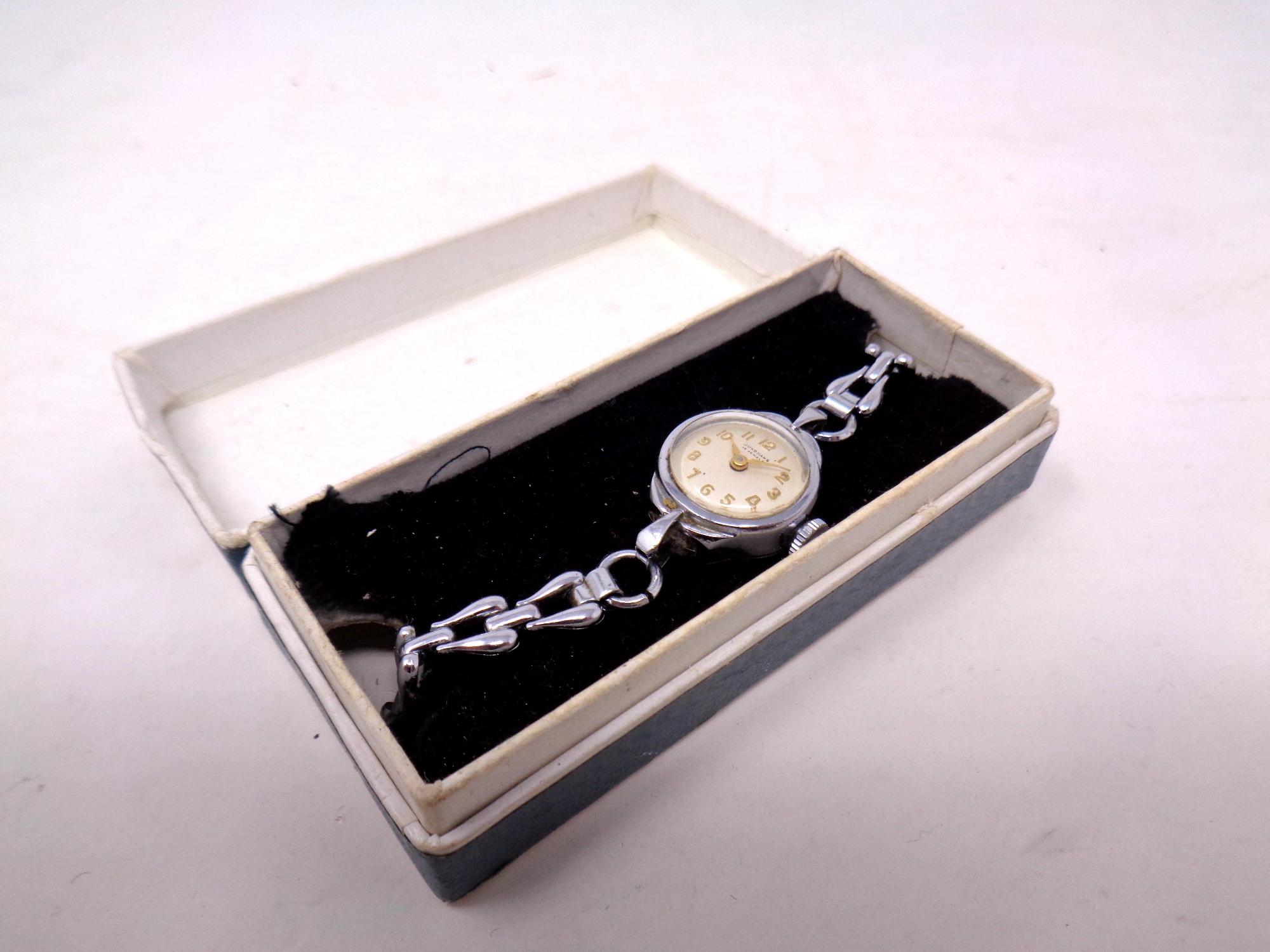 A lady's vintage Junghans watch in box