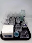 A tray containing assorted glassware to include wine glasses,