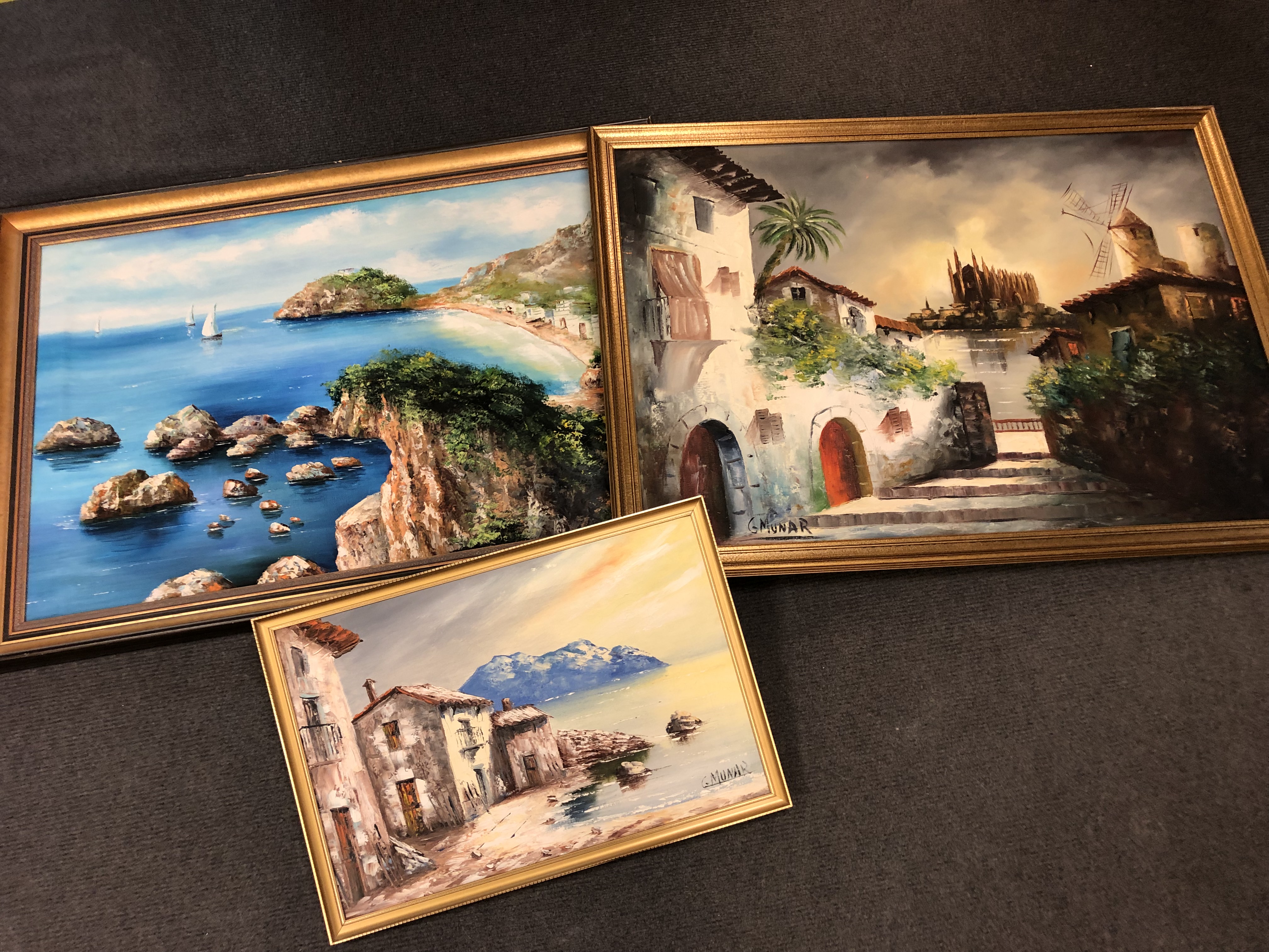 Three Spanish oil paintings on canvas by G Munar, coastal scene etc.