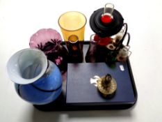 A tray containing assorted glassware to include coloured glass vases,