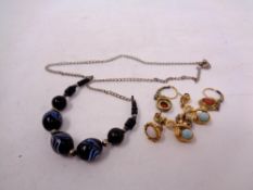 A vintage necklace together with a quantity of earrings