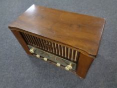 A 20th century Monark walnut cased valve radio