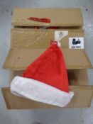 Two boxes containing a quantity of Christmas hats