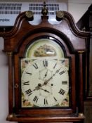 A 19th century oak cased longcase clock with painted dial,