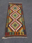 A Maimana kilim runner, 137cm by 60cm.