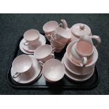 Two trays containing a quantity of pink tea china