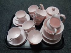 Two trays containing a quantity of pink tea china