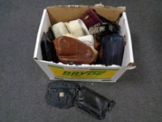 A box containing large quantity of assorted handbags