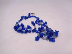 An old two-tone blue necklet