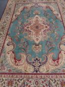 A Kirman carpet, South East Iran, 337cm by 257cm.
