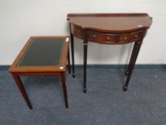 A Regency style D-shaped hall table fitted two drawers together with a further coffee table with a