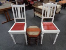A pair of white painted bedroom chairs together with a hexagonal footstool