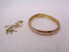 A silver gold plated bangle and necklace